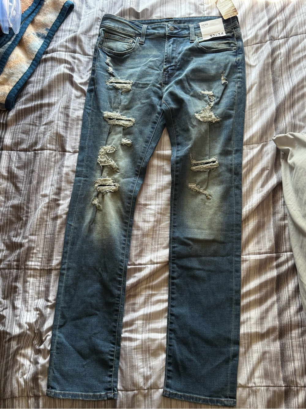 Aeropostale Women's Distressed Straight Leg Jeans in Blue Wash